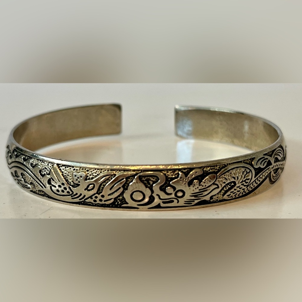 Beautiful vintage hand engraved silver dragon and Phoenix cuff bracelet.